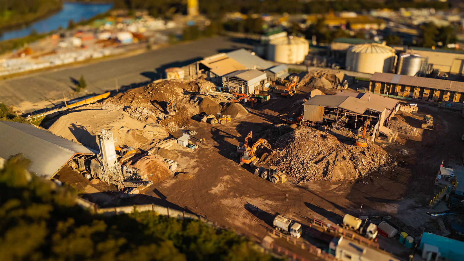 Aerial view of an industrial yard with machinery at work